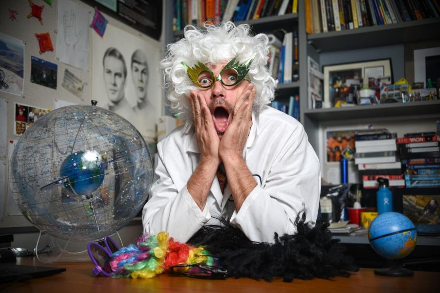 Erin O’Connor shows off his “alternative learning” techniques in his office on April 29, 2019, at City College in Santa Barbra, Calif. He said he uses his collection of wigs and funky glasses to engage and teach students.