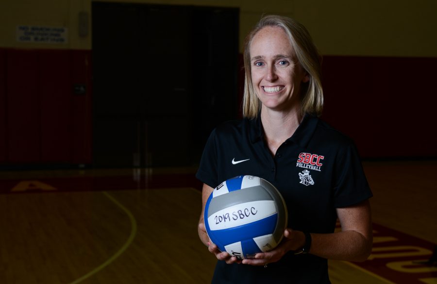 Kat Niksto, the new SBCC Womens Volleyball coach smiles in the Sports Pavilion just after her team took down College of the Canyons in 4 sets on Wednesday, Sept. 11 2019, at City College in Santa Barbara, Calif. This is the first win of the season for the Vaqueros, bringing their record to 1-5.