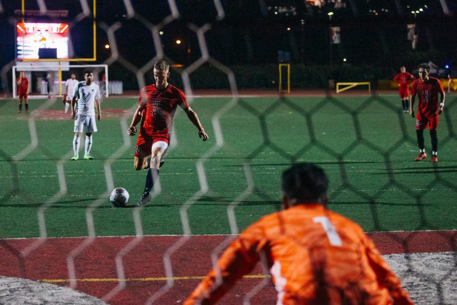 Kyle Nicklaw kicks a goal scoring shot towards East Los Angeles Community College Goalkeeper Oscar Ponce on Tuesday, Sept. 24, 2019, at La Playa Stadium in Santa Barbara, Calif. Nicklaw scored 3 consecutive goals in the first half for The Vaqueros. v