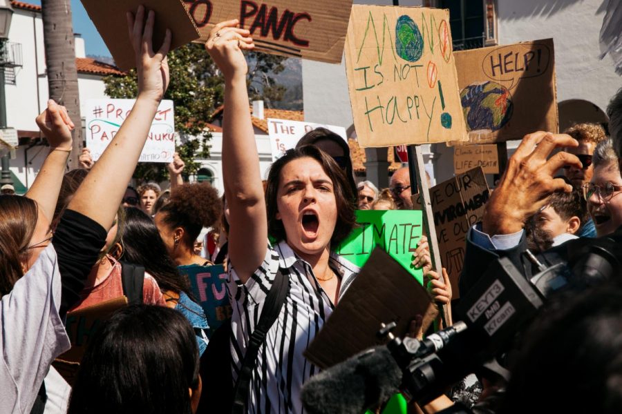 Santa Barbara High School student Eli Papadopoulous starts the chant “it’s real, it’s now, climate is in our hands now!” on Friday, Sept. 20, 2019, at De La Guerra Plaza in Downtown Santa Barbara, Calif. Around the globe masses of young people left school to protest human influence on climate change and hundreds marched down State Street chanting and encouraging others to join them.