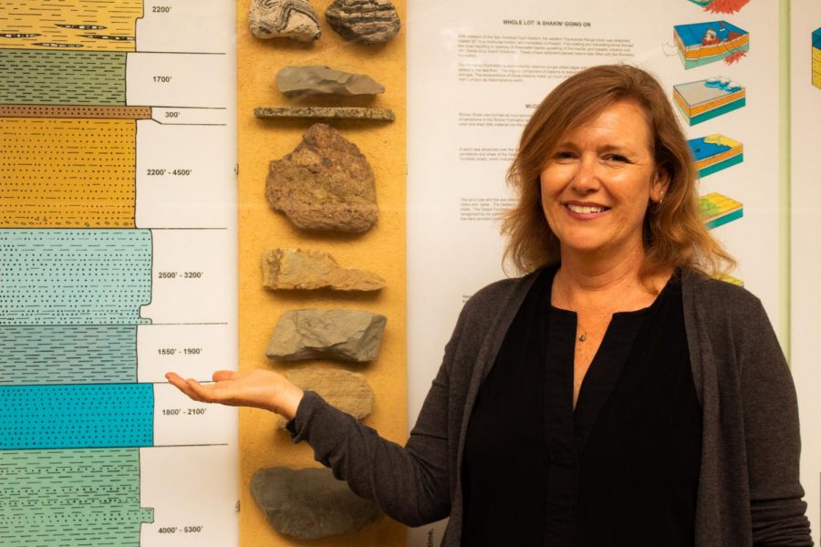 Kristen Sneddon displays one of the various visual aids the Geology department has to offer in the Earth and Planetary Sciences Building on Wednesday, Sept. 25, 2019, at City College in Santa Barbara, Calif. Sneddon is the district four Santa Barbara City Council member and recently became a full-time faculty member at City College.