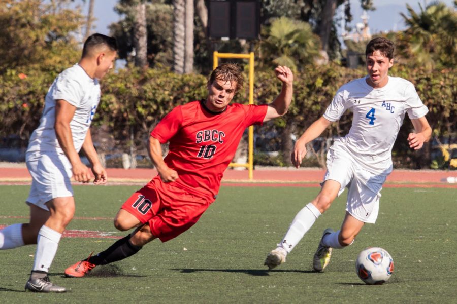 Christopher Robinson (10) cut through the Santa Maria defenders and continued down field towards the goal on Tuesday, Oct. 15, 2019, at La Playa Stadium at City College in Santa Barbara, Calif.