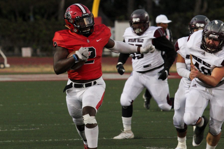 Will Bayonne (2) avoids Antelope Valley defenders and runs for a touchdown on Oct. 5, 2019, at La Playa Stadium at City College in Santa Barbara, Calif. Bayonne was the only Vaquero to score in Saturday's game.
