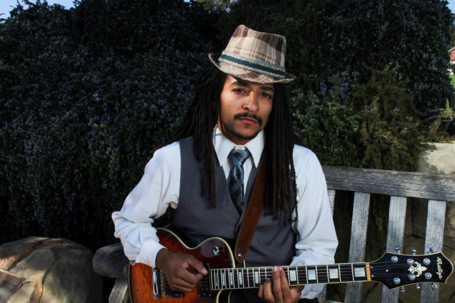 Brandon Kinalele showing off some of his skills on his guitar on Friday Oct. 11, 2019 on West Campus at City College in Santa Barbara, Calif. Kinalele has been performing music for 11 years.