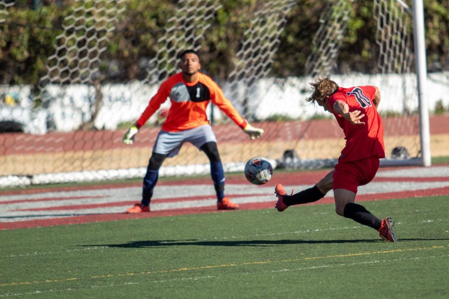 Christopher Robinson (No.10), getting his shot off but Miguel Granados (No.1), stopped the shot from scoring on Oct. 25, 2019, at La Playa Stadium at City College in Santa Barbara, Calif.