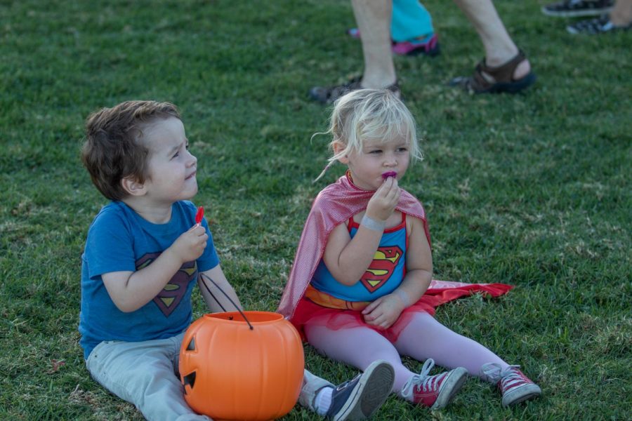 From left 2 year-olds Gabriel Pelton and Keona Dato enjoy candy from the Trunk or Treat festival on Friday, Oct. 25, 2019, on West Campus at City College in Santa Barbara, Calif. The festival was made for kids to enjoy quality time with loved ones.