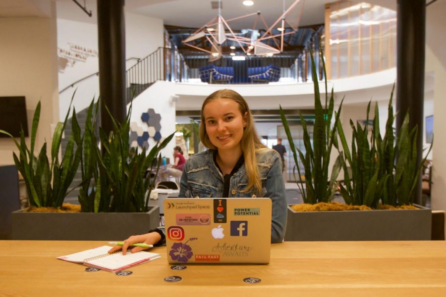 18 year-old former dual-enrollment City College student Amanda Moores, works on the development of her business Flora, in her typical workspace at Kiva Coworks on Wednesday, Oct. 16, 2019, in Santa Barbara, Calif. Flora will be an app designed to boost wellness and reduce stress levels.