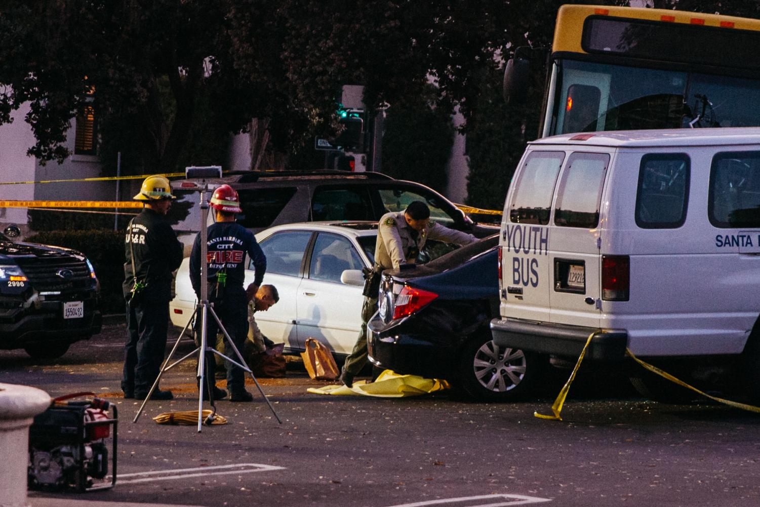 Santa Barbara Authorities and first responders prepare to remove the covered body of the woman killed by MTD bus 907 on Wednesday, Oct. 9, 2019, on Chapala and West Figueroa Street in Downtown Santa Barbara, Calif.