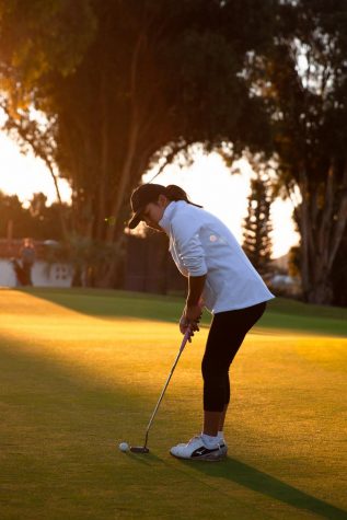 Pratima Sherpa aligns her put down the hole 3 putting green at the Santa Barbara Golf Club for her 18 hole practice game early Wednesday, Oct. 23 in Santa Barbara, Calif.