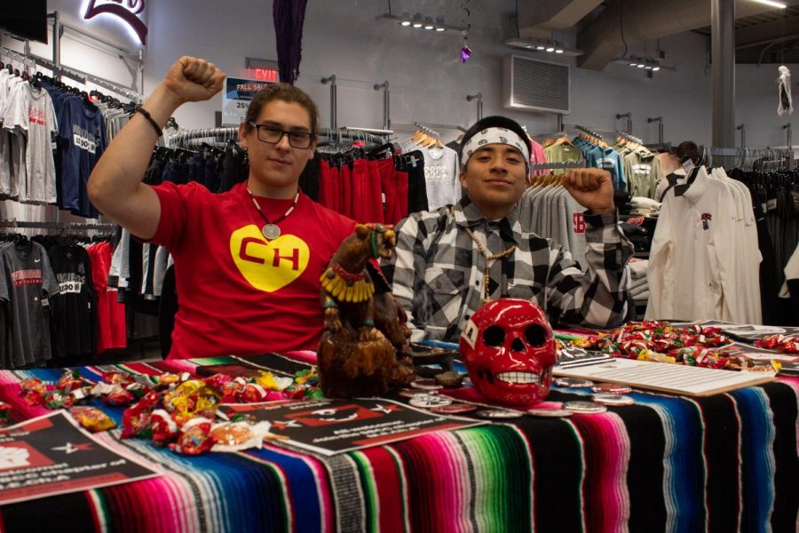 From Left, Diego Lazcano and John Esteban set up in the Campus Bookstore to represent the MEAChA Club and reach out to students to share their culture and enlighten others about who they are and what they stand for on Oct. 31, 2019, at City College in Santa Barbara, Cailf.