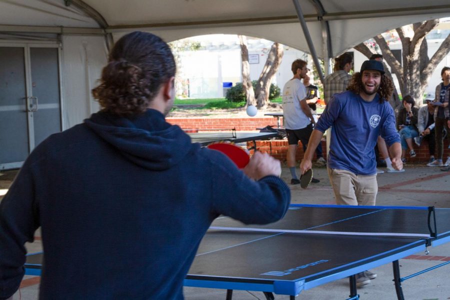 From right, Ben Early plays a friendly match of ping pong with Elliot Kerrin for the Ping Pong Club Tournament on Thursday, Nov. 21, 2019, outside the Student Services Building on East Campus at City College in Santa Barbara, Calif.