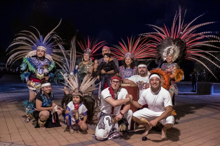 Diego Lazcano (Bottom right, left) and John Esteban (bottom right, right) meets with a Danza Azteca group at the St. Raphael Catholic Church in Goleta, Cailf., on Oct. 29, 2019, to perform a dance to express their culture and ancestry. 