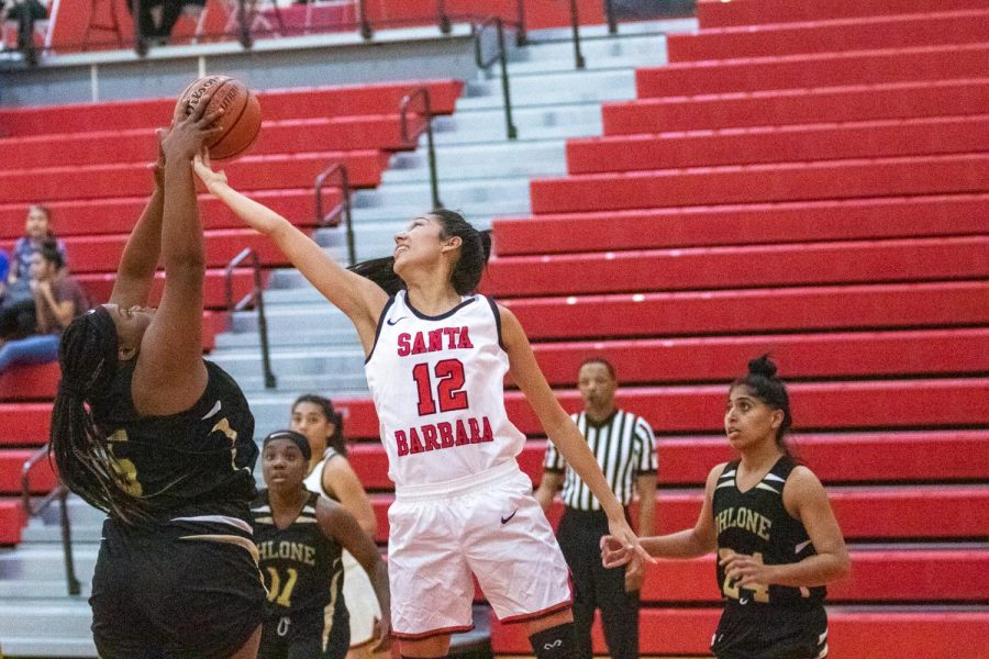 Sophia Torres (No.12) blocks Breanna Thomas (No.5) on Sunday, Nov. 3, 2019, in the Sports Pavilion at City College in Santa Barbara, Calif. The Vaqueros came out with a 76-56 win over Ohlone Community College.