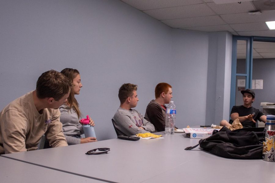 From right, Cage Englander talks about the democratic debates from the previous night on Thursday, Nov. 21, 2019, in the Campus Center at City College in Santa Barbara, Calif. We are not trying to change minds, we are trying to change dialogue, said Englander.