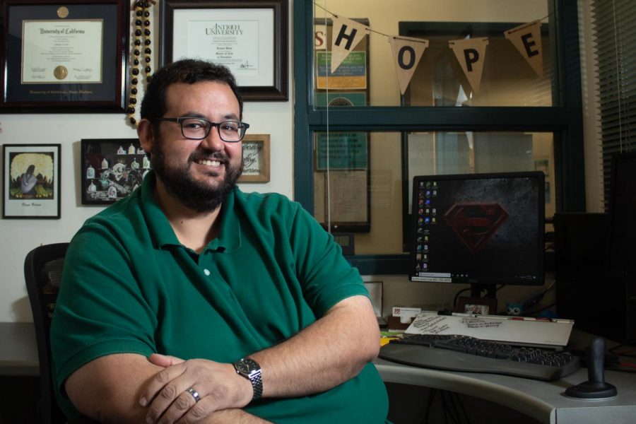 Ismael Paredes Ulloa shows smiles in his office on Tuesday, Nov. 5, 2019, in the Student Services Building at City College in Santa Barbara, Calif. Ulloa and his two siblings are children of immigrants from Jalisco, Mexico.