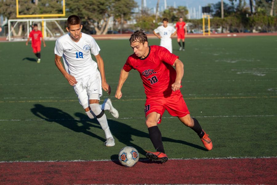 Christopher Robinson (No.10) makes his way towards the goal but Brandon Calderon Ruiz (No.19) tries to stop him on Sunday, Nov. 10, 2019, at La Playa Stadium at City College in Santa Barbara, Calif.