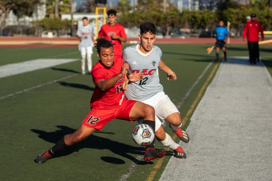 JahMikaili Hutton (No.12) tries to shrug off Bryan Oseguera (No.12) on Saturday Nov. 23, 2019, at La Playa Stadium at City College in Santa Barbara, Calif. After a long game the Vaqueros lost 3-1 in penalty Kicks against Santa Ana.