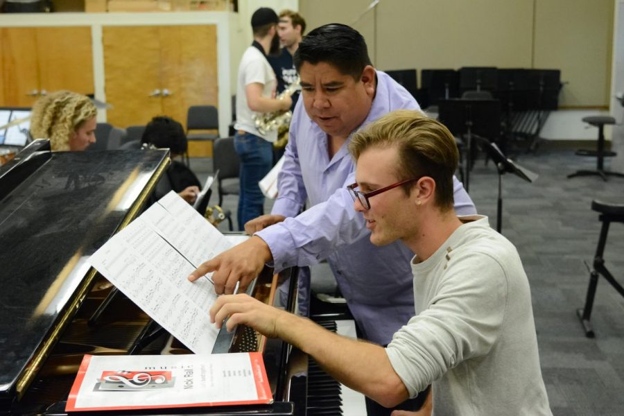 Music instructor Tony Ybarra helps David Struven perfect his piano playing for the Applied Music Program on Friday, Nov. 16, 2019, in the Drama/Music Building on West Campus in Santa Barbara, Calif.