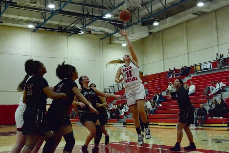 Jordan Parkhurst (No. 11) scores on a lay-up after charging past all of the defenders during the game against San Diego City College on Thursday, Nov. 7, 2019, at City College in Santa Barbara, Calif. The Vaqueros won the game 81-74 after trailing by 10 points in the 4th quarter.