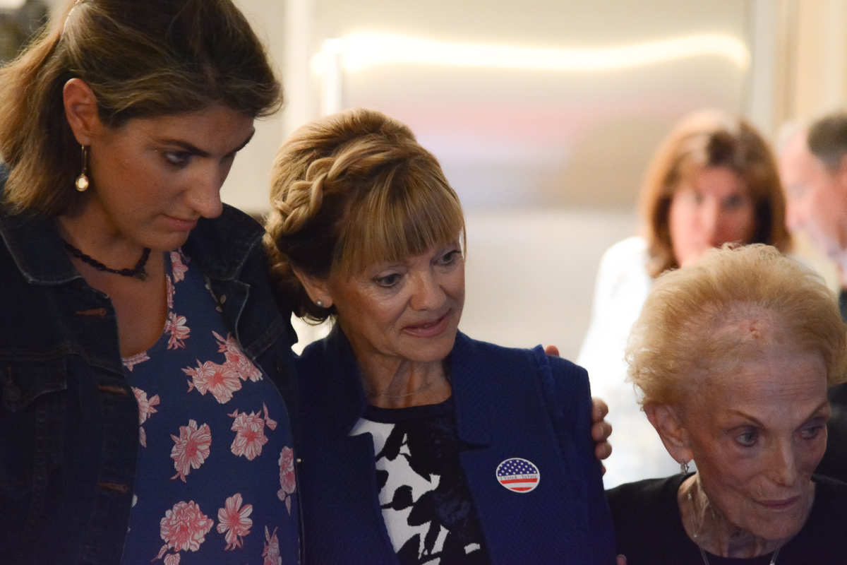 Teri Jory (middle) along side her mother (right) and her campaign social media director Christina Schowe (left) the moment they received the results and found out Jory was behind by over 400 votes.