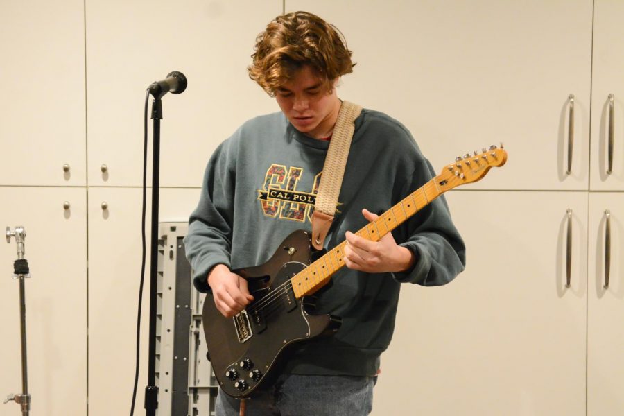 Lead singer and guitarist for the band Lizards Mouth Cameron Meza performs their original song Greedo in one of the band members garages on Wednesday, Nov. 20, 2019, in Santa Barbara, Calif.