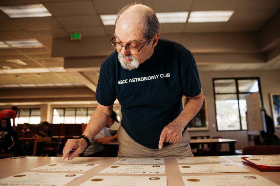 David Salvia organizes the 11 associate degrees and two certificates he received from City College over the last 13 years in the Luria Library on Thursday, Oct. 31, 2019, at City College in Santa Barbara, Calif. Salvia is 72 years-old and has been pursuing his love for learning at City College since 2006.