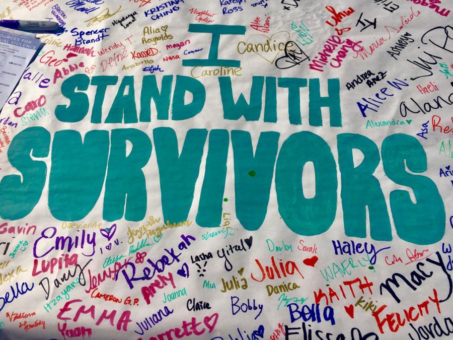 Students have called for action from campus officials after widespread backlash towards UCSB-PD and administration’s failure to identify the fraternity involved in numerous sexual assault incidents on Thursday, Oct. 31, 2019, on the UCSB campus in Santa Barbara, Calif. A table covered in paper reading I Stand With Survivors was embellished with colorful names as a welcoming gesture for people to sign.