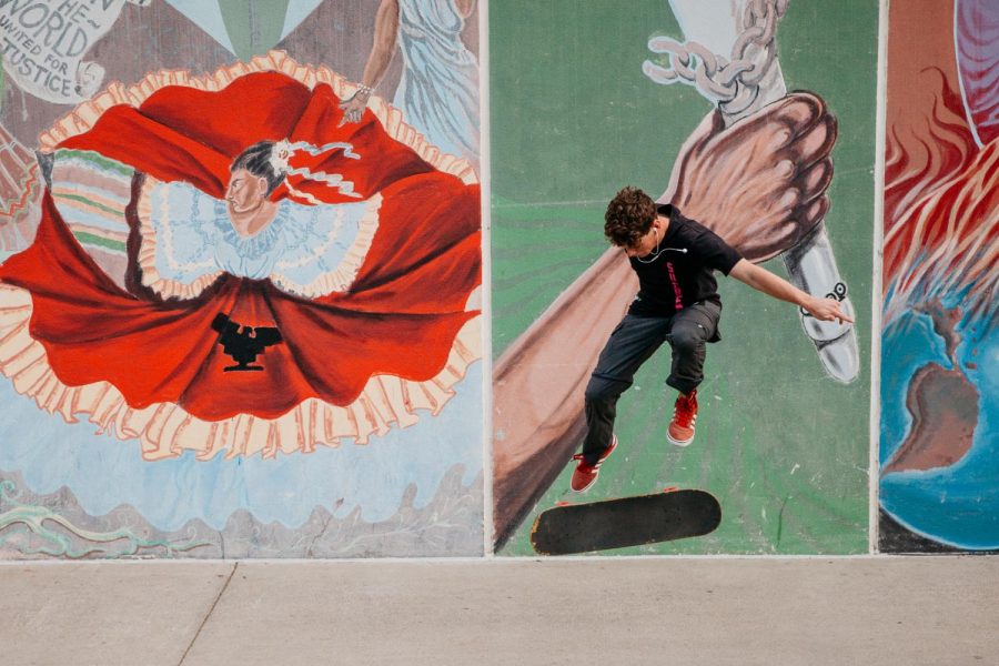 Dylan Osgood heelflips on Wednesday, Nov. 17 outside the East Campus Cafeteria.