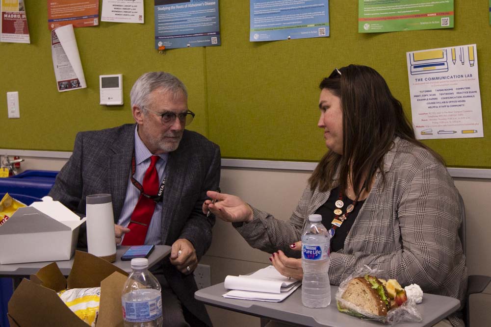 Vice President of Human Resources Michael Shanahan (left) and Cheryl Brown of the Physical Services Department discuss a prompt given by speakers from UCSB during the seminar on LGBTQ+ issues on Tuesday, Jan 28, 2020, in the West Campus Center in Santa Barbara, Calif.