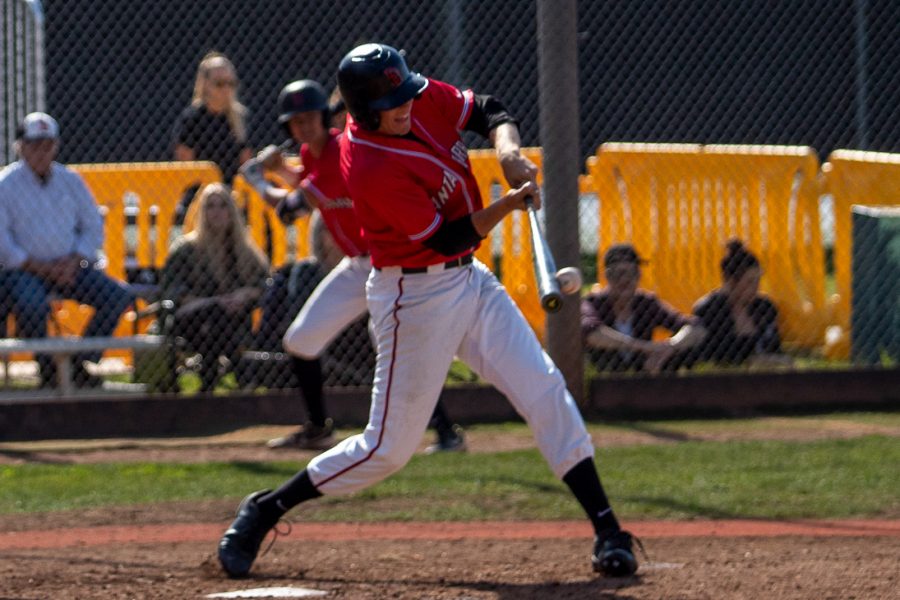 Toby Spach (No.17) hits the ball and gets a single on Saturday, Feb. 15, 2020, at Pershing Park at City College, in Santa Barbara, Calif. The Vaqueros beat Cerro Coso Community College 8-1.