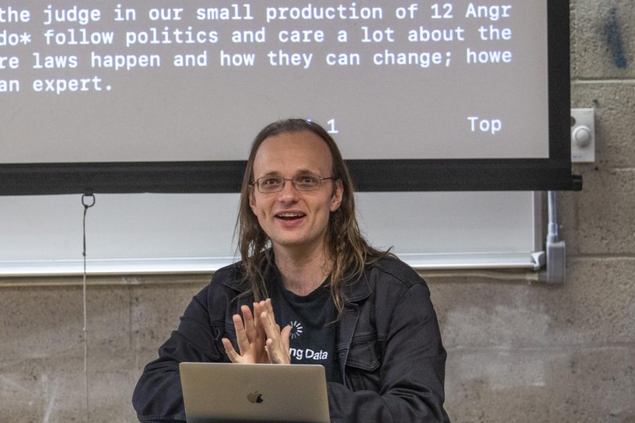 Jay freeman points out specific legal terms that involve Jailbreaking a phone on Friday, Feb. 21, 2020, in the Physical Science Building at City College in Santa Barbara, Calif. The short version is, jailbreaking your phone is legal Freeman said after being asked by a student.