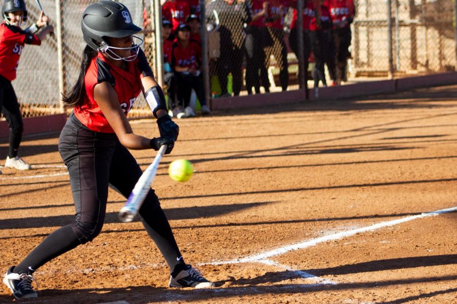 Outfielder Sinai Miranda (no. 18) just grazes a pitch from a Canyons pitcher on Feb. 25, 2020 at Pershing Park in Santa Barbara, Calif. The at bat ended in a strikeout.