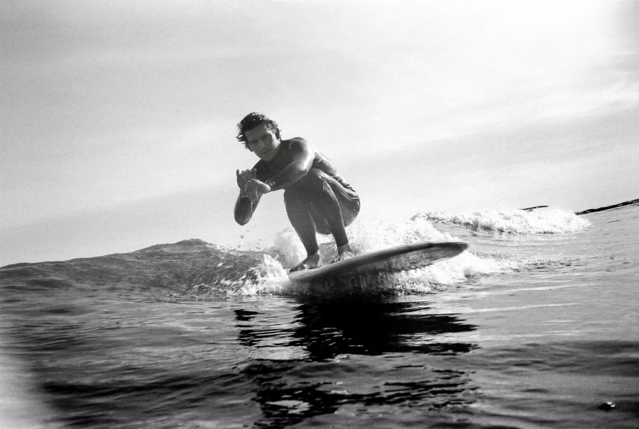 Surfer and surf photographer Luke Williams rides a wave at Leadbetter Beach on Wednesday, Feb. 26 in Santa Barbara, Calif. “It feels good to just get wet and float around,” Williams said. “Even when the waves are this small.”