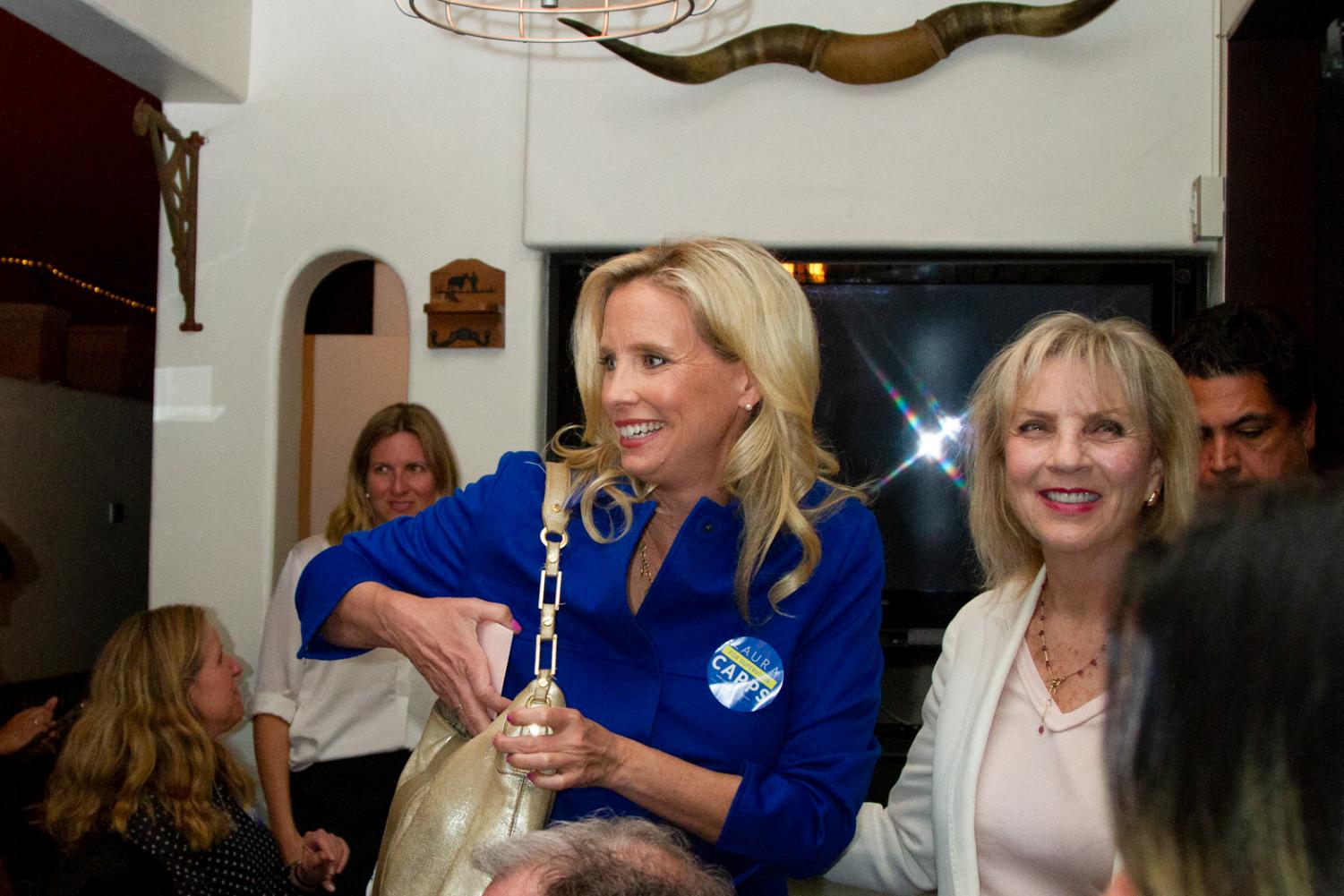 Laura Capps similes while entering her joint election party with Elsa Granados on Tuesday, March 3, 2020 at Jill's Place Restaurant in Downtown Santa Barbara, Calif. Laura said that she can be optimistic and positive about her campaign because they were able to communicate with voters.