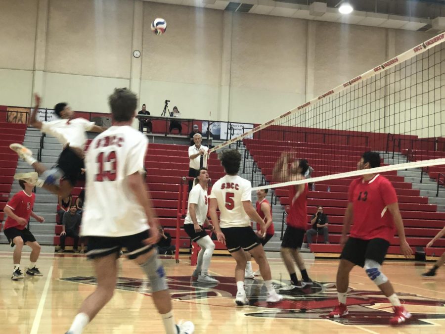 Keoni Thiim, six kills, goes up for a spike during the first set of City Colleges sweep of Pierce College mens volleyball.