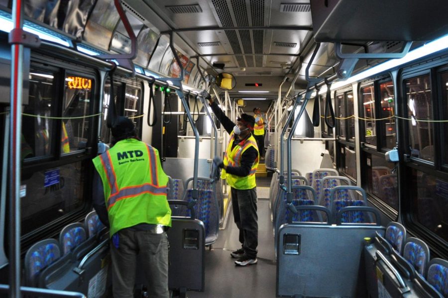 MTD workers clean and disinfect a city bus after hours. An additional team has been brought in to aid with the sterilization. Photo courtesy of Hillary Blackerby, MTD.