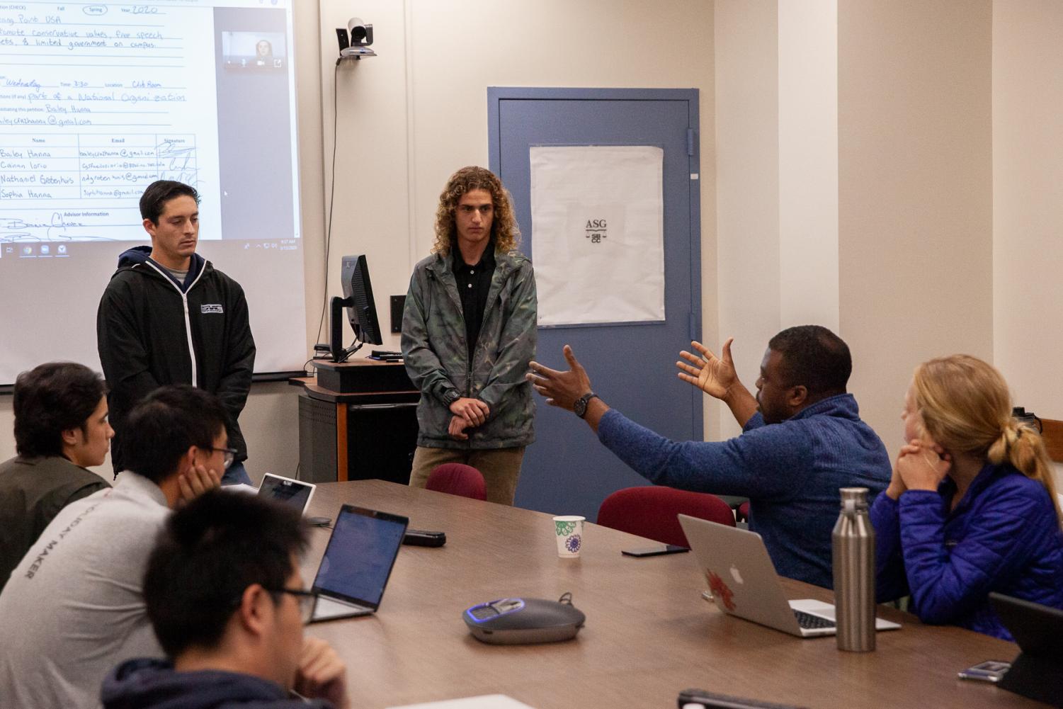 Student Senator Kenny Igbechi argues with student representatives for Turning Point USA about the controversy surrounding the organization during the club charter pitch on Friday, March 13, in the ASG meeting room, Campus Center Room 223, at City College in Santa Barbara, Calif. “This is not time for you to ask questions, it’s our time to ask you questions,” Igbechi said to Turning Point rep. Bailey Hanna.
