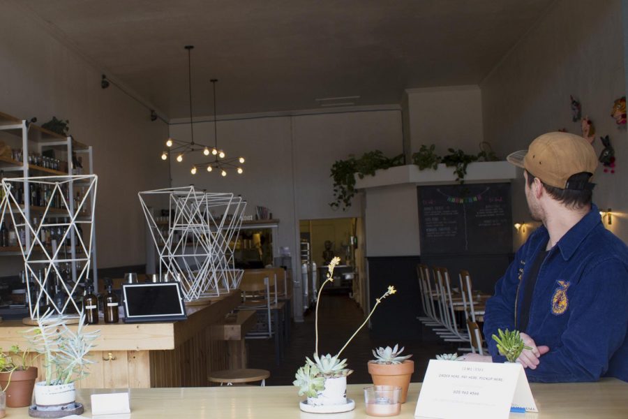 Co-Owner of Sama Sama Kitchen Tyler Peek looks back at the empty dining room on Wednesday, March 18, 2020, in Downtown Santa Barbara, Calif. Sama Sama is one of the many restaurants downtown still open for the time being, but only offering take-out or delivery options as a precautionary measure against spreading COVID-19.