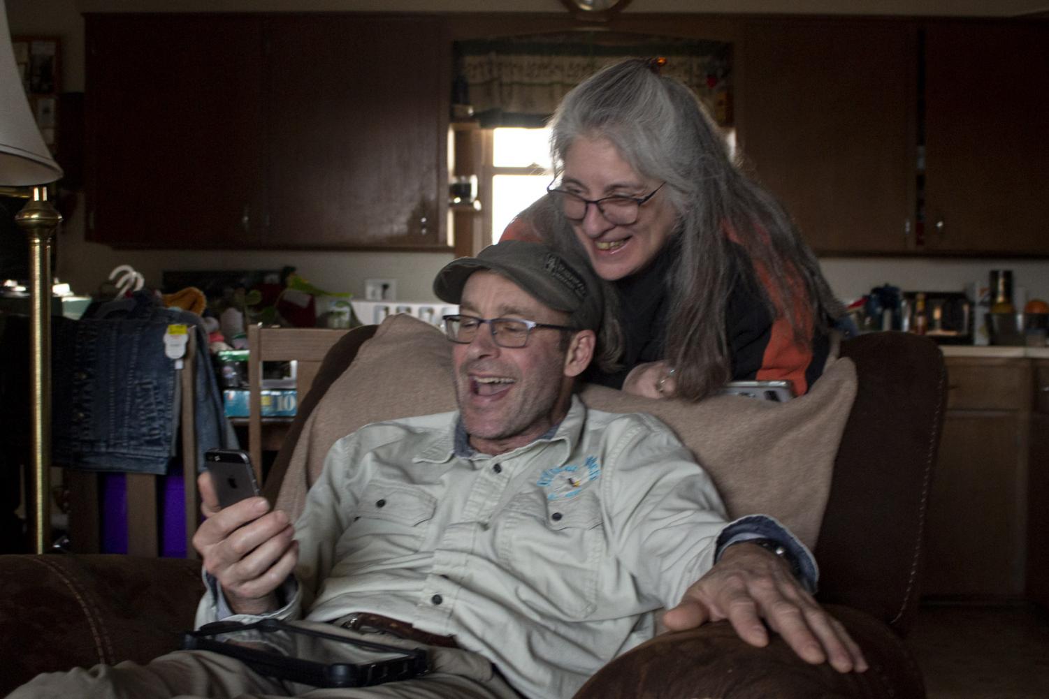 Mitch Schrage and Terese Brunner laugh with their 3 year-old grandson Oscar over facetime on April 10, at their home in New Holstein, Wis. Both Schrage and Brunner are sad that they’re unable to babysit Oscar or see him in person, but they’re thankful to see him through video chat.