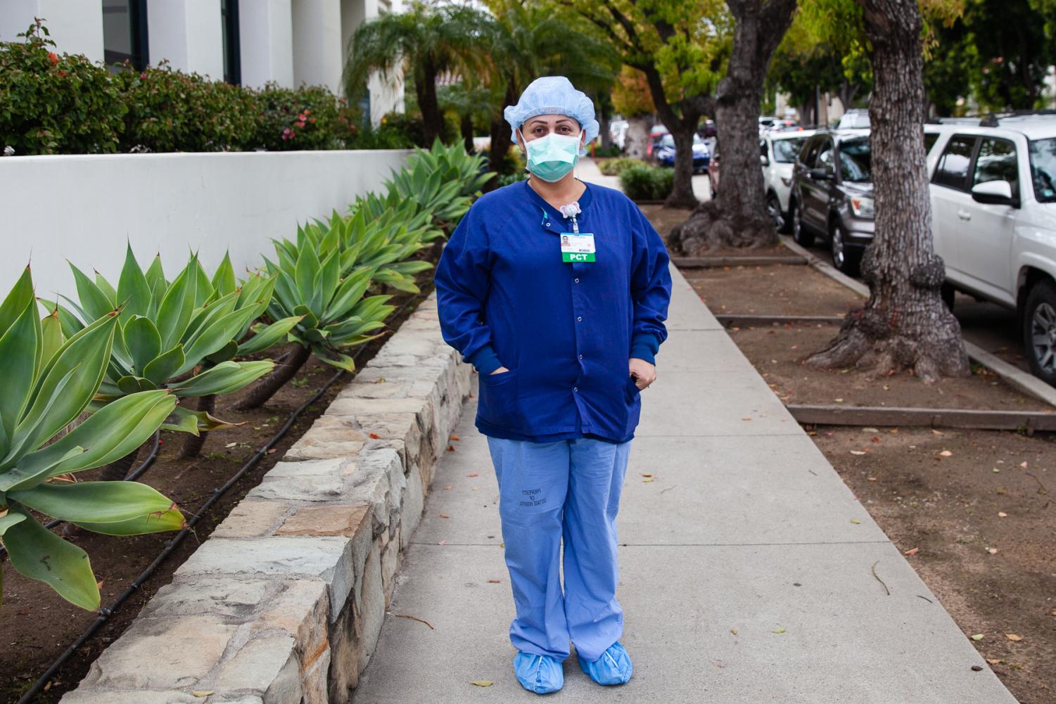 Unit Care Coordinator Johanna Hoyos works in the surgery department at Cottage Hospital in Santa Barbara, Calif. “It’s been hard personally because I work nights now and everyone is being shifted around,” Said Hoyos. “The hospital is doing great at protecting us with all the precautions, I feel as safe here as I do at home.”