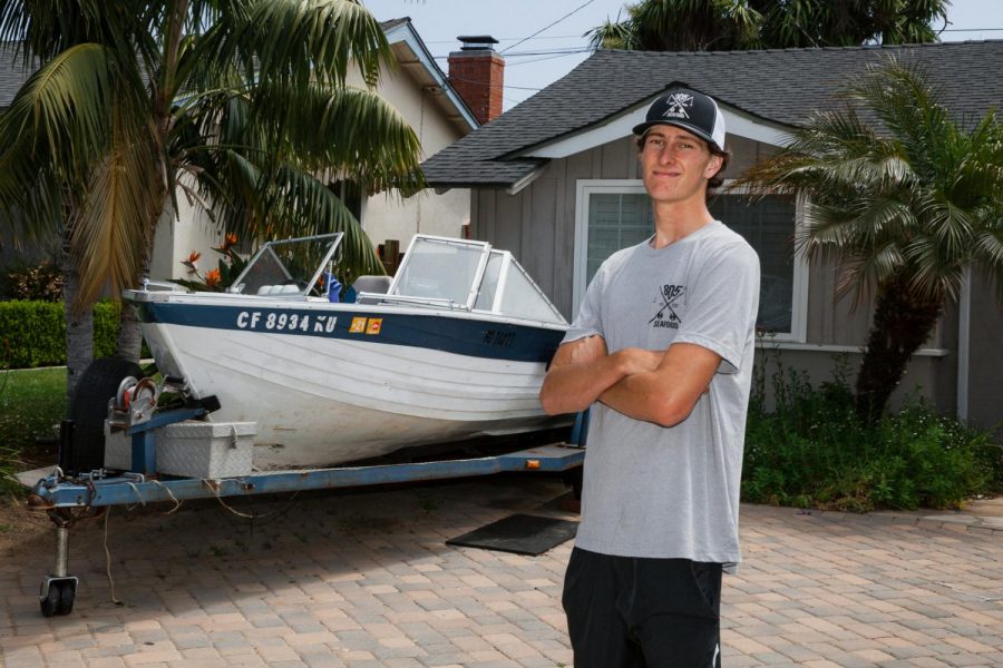 Connor Streett started his business 805 Seafood as a fish vendor at 17 years old and is grateful for customers still buying local fresh fish during the pandemic in front of his home and fishing boat on Thursday, April 30, 2020 in Santa Barbara, Calif.