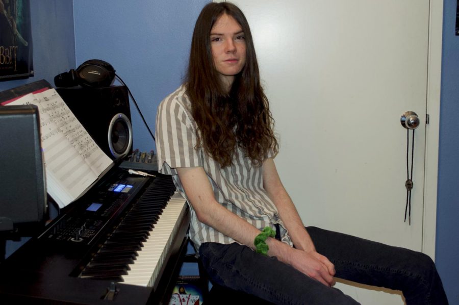 Michael Shove sits in front of his electric piano on Sept. 26 in his home in Santa Barbara, Calif. Shove composes his own songs and enjoys experimenting on his piano.