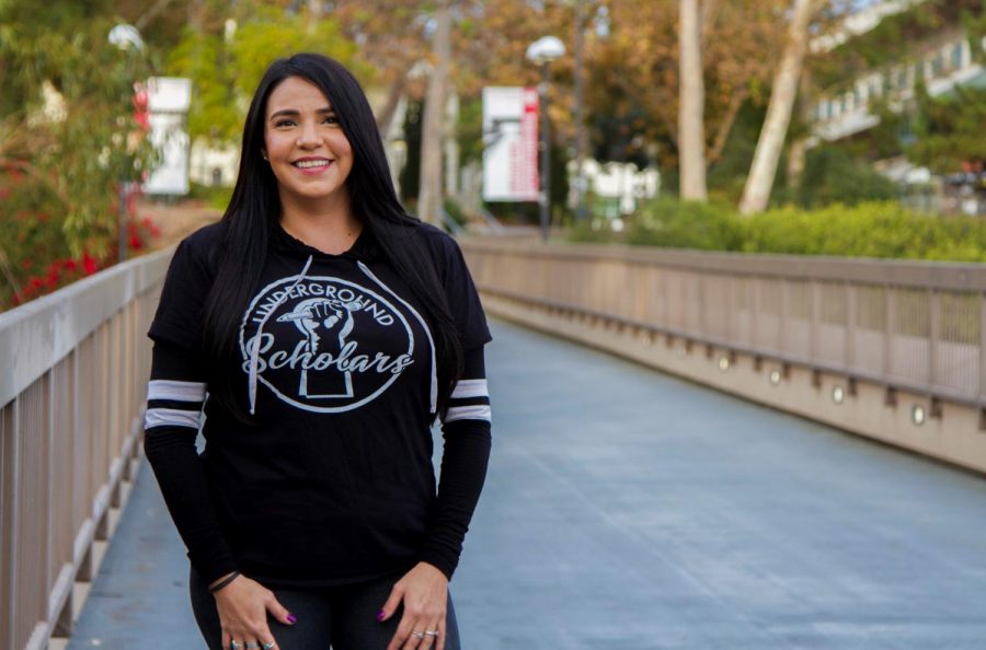 Lisandra Barrera, student ambassador for the Underground Scholars Initiative, stands on the footbridge at City College on Nov. 20, 2020, in Santa Barbara, Calif. Barrera has been the ambassador for the USI since January.