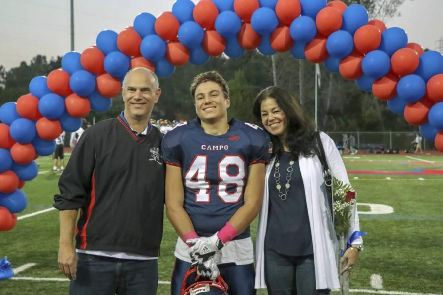 Courtesy image of Dylan Grausz and his parents Michael and Martha in November 2018 at Campolindo High School in Moraga, Calif.