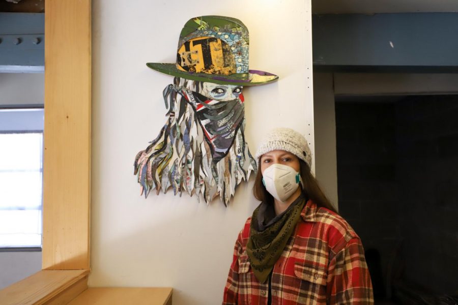 Inga Guzyte next to her self portrait titled “Super Rebel - Me” on Nov. 30 at her studio in Santa Barbara, Calif. When Guzyte first came to City College she was unaware that being an artist could be a career choice. Now years later, she makes a living and an impact with her art.