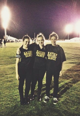 From right to left, Jacob Frank after a performance with sisters Jordan and Jaycie Frank on Sept. 27, 2013, at Xavier College Preparatory High School in Palm Desert, Calif. Jacob and his sisters had been dancing together for over five years, and just performed at a Xavier football game.