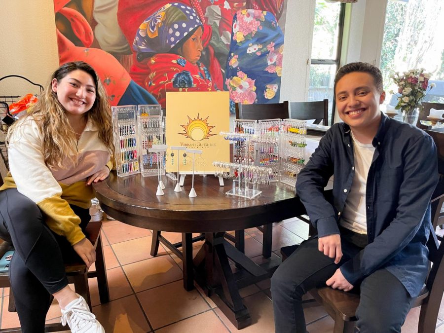 Solé Machart (left), and her boyfriend Mateo Ochoa with the inventory from Macharts jewelry business Vibrant Sunshine on Feb. 18, 2021 from Macharts home in Santa Barbara, Calif. Machart started making jewelry for fun and now sells her unique handmade jewelry on her Etsy shop.