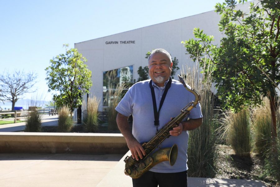 Jazz instructor Andrew Martinez with his saxophone outside the Garvin Theater on Feb. 23, 2021, at City College in Santa Barbara, Calif. Martinez first started playing the saxophone when he was in 8th grade and has never put it down since.