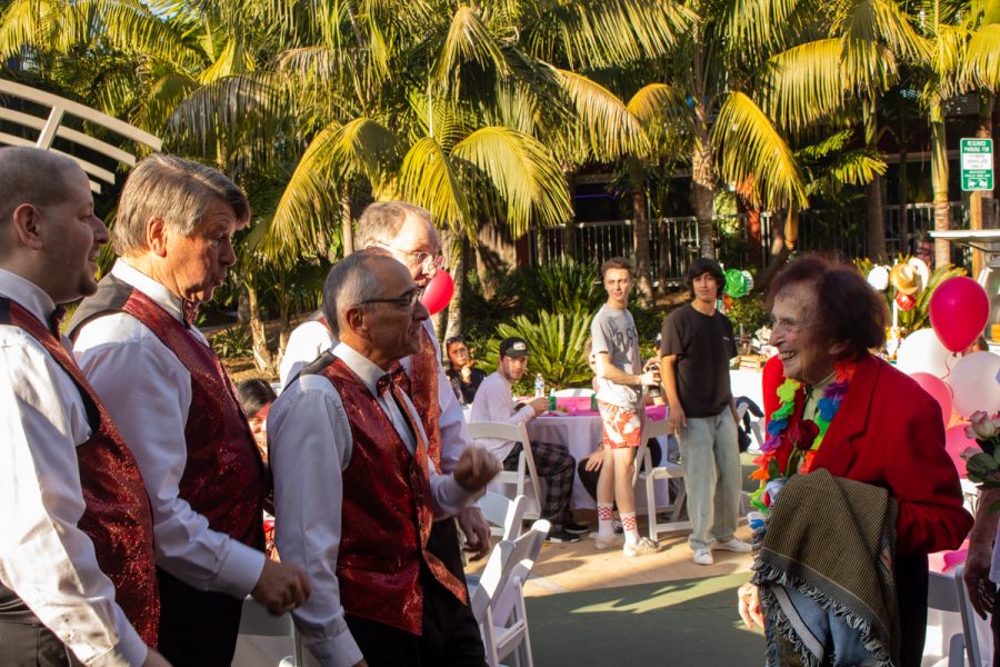 Jean Nell, right, smiles while being serenaded by the barbershop quartet Modern Nostalgia at her 96th birthday party on Friday Feb. 14 2020 at Beach City in Santa Barbara, Calif. Nell lived at her apartment with an ocean view at Beach City for nearly 30 years. She originally moved into the apartments before they were converted into student housing.