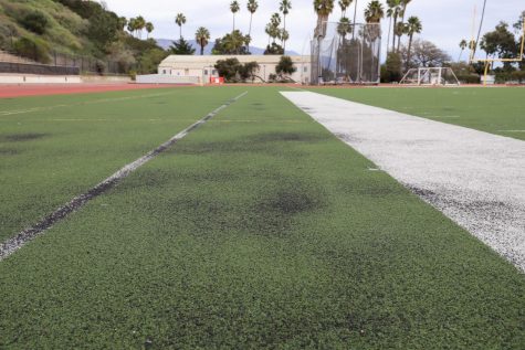 The black gravel that is laid down before artificial turf is installed now shows through in all areas of the La Playa Field at City College in Santa Barbara, Calif. The 11-year-old artificial turf that has an eight year life span is three years overdue on a replacement.